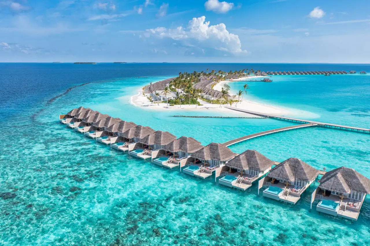 Maldives overwater villas turquoise lagoon